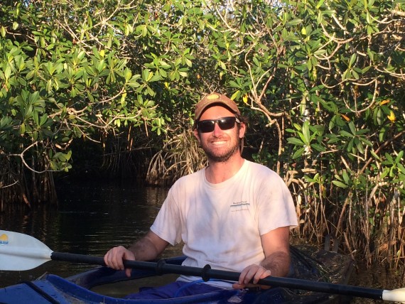 Biology student Sean Charles enjoys kayaking in the Everglades. The researcher is studying the effects of sea level rise on Florida mangroves and their ecosystems.