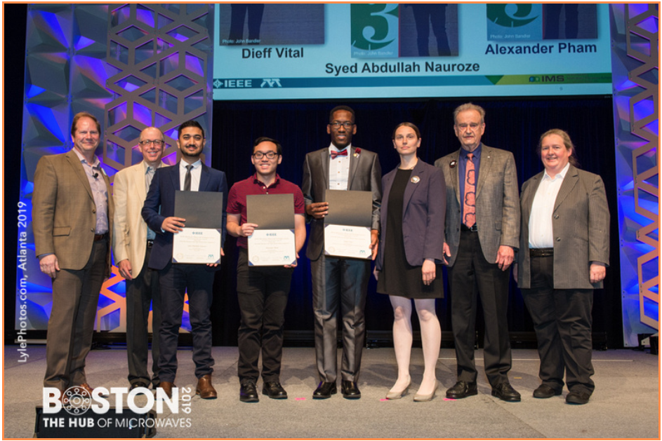 Dieff Vital receiving honorable mention at the 2019 International Microwave Symposium (IMS).