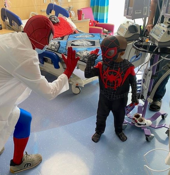 Dr. Spider-Man: Alumna is a superhero who wears a white coat | FIU News -  Florida International University