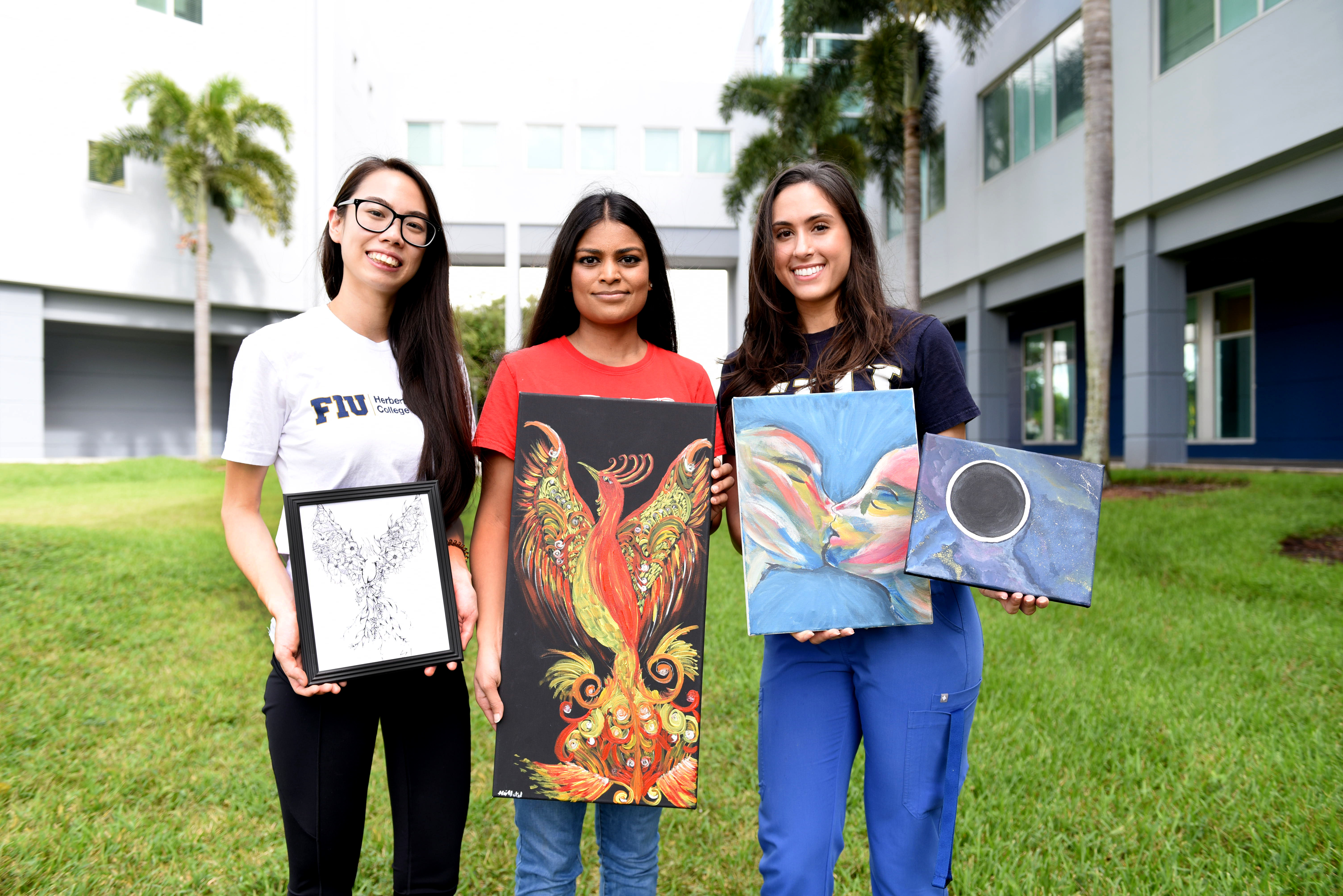 Medical students Sally Trinh, Kajal Patel and Cecilia Nosti donated original artwork to the Herbert Wertheim College of Medicine's Mammography Art Initiative.