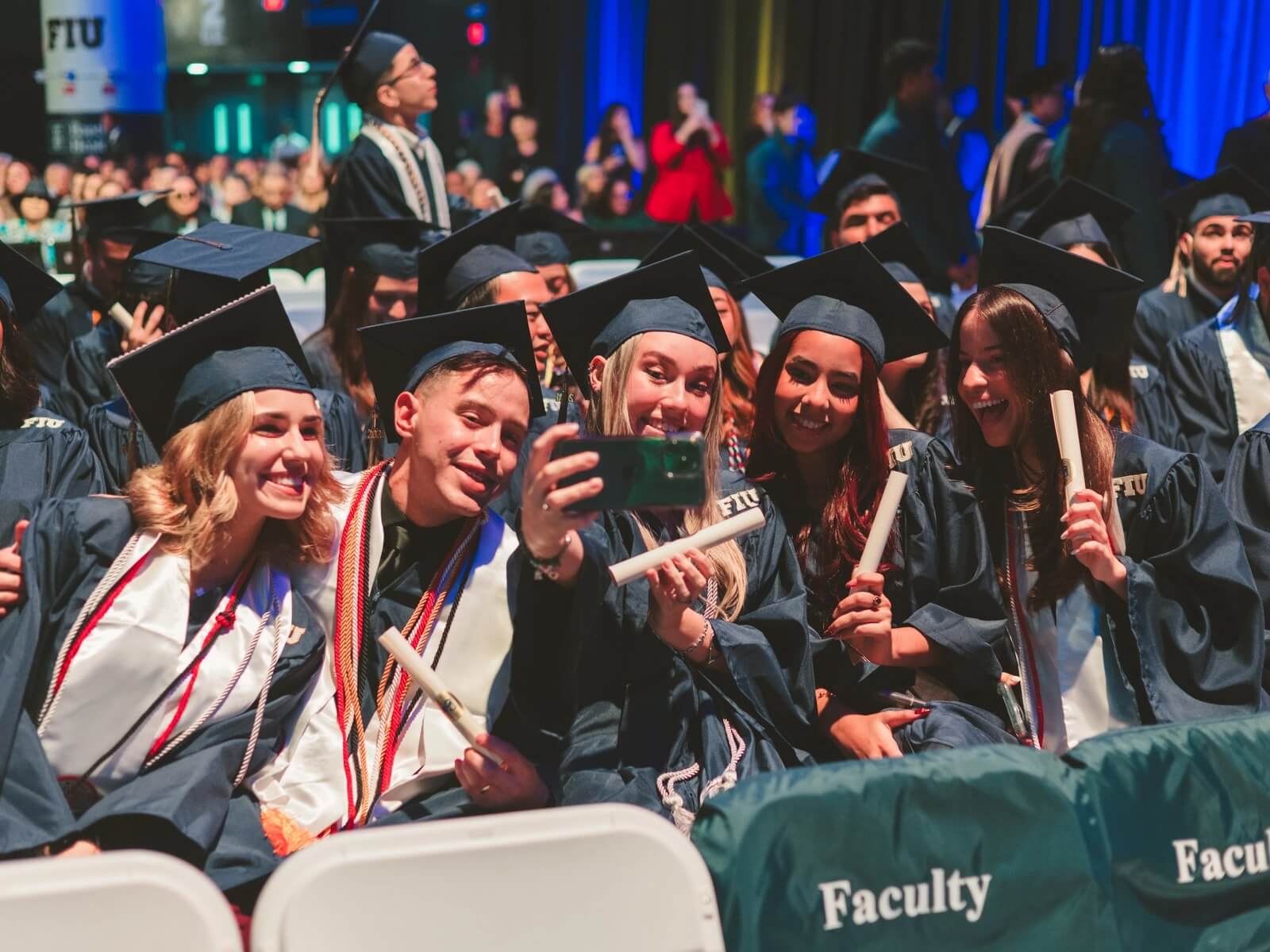 Graduates taking a selfie