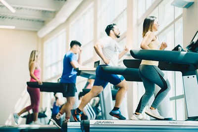 Four students run on treadmills in WRC