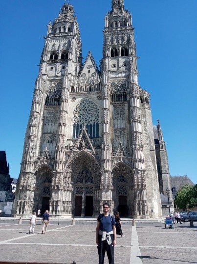 Nelson while traveling in Europe in front of Saint Gatien Cathedral Tours, France