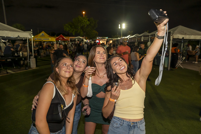 Beer lovers pose for a selfie during the 2024 North Miami BrewFest.