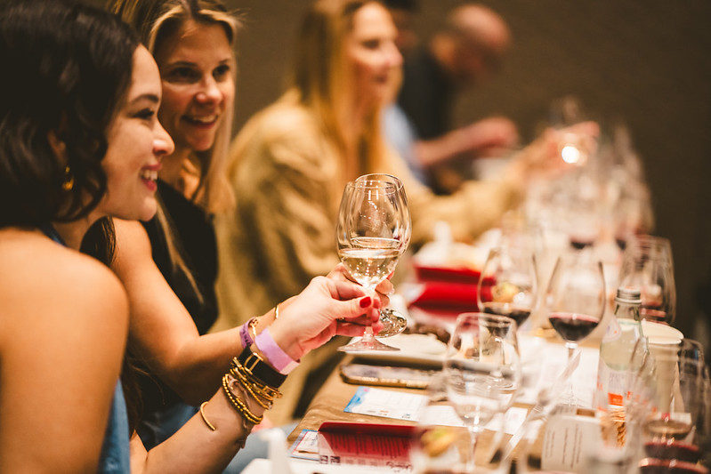 Wine lovers attend a 2024 SOBEWFF(R) FIU & SGWS led seminar, a great holiday gift idea.