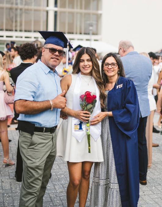 Graduate with her parents