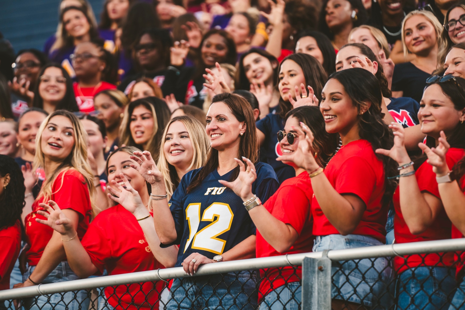President Jeanette M. Nuñez with students in sororities.