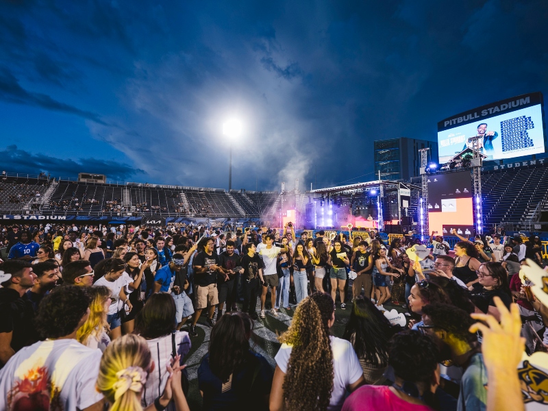 Students celebrating at the Pitbull Stadium