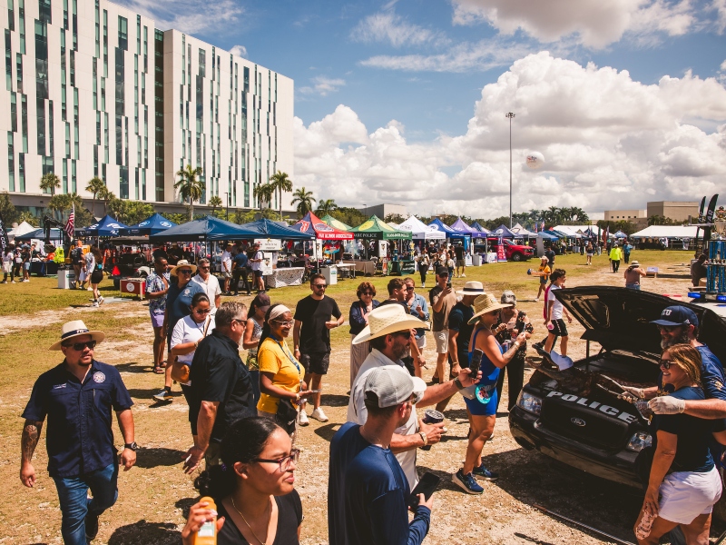 Attendees enjoying the pig roast