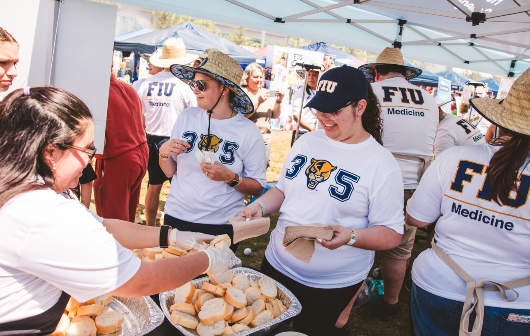 FIU folks getting a side dish of Cuban bread rolls