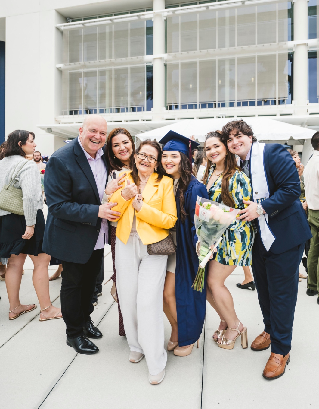 Graduate celebrating with her family