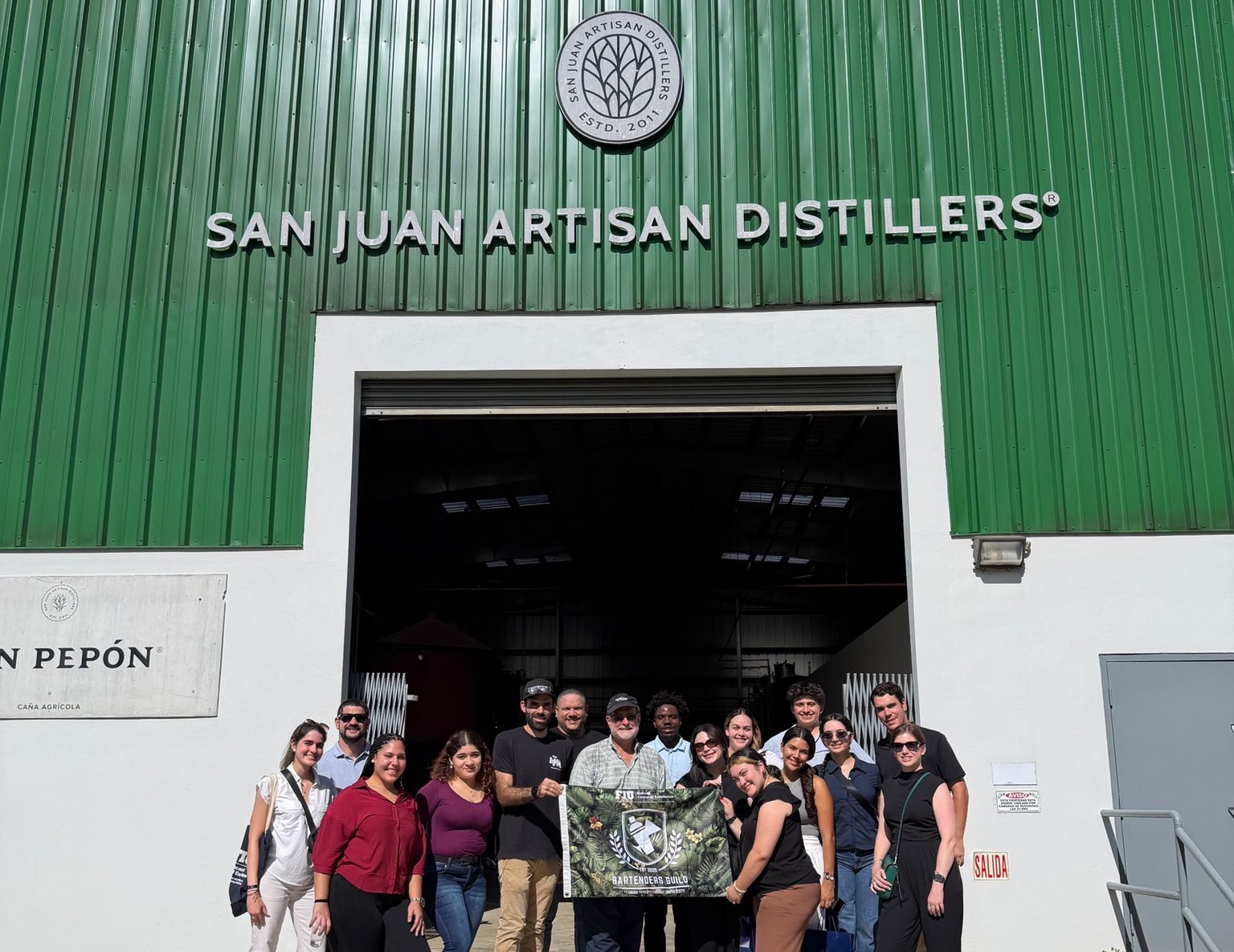 Students visit a smaller distillery called San Juan Distillers.