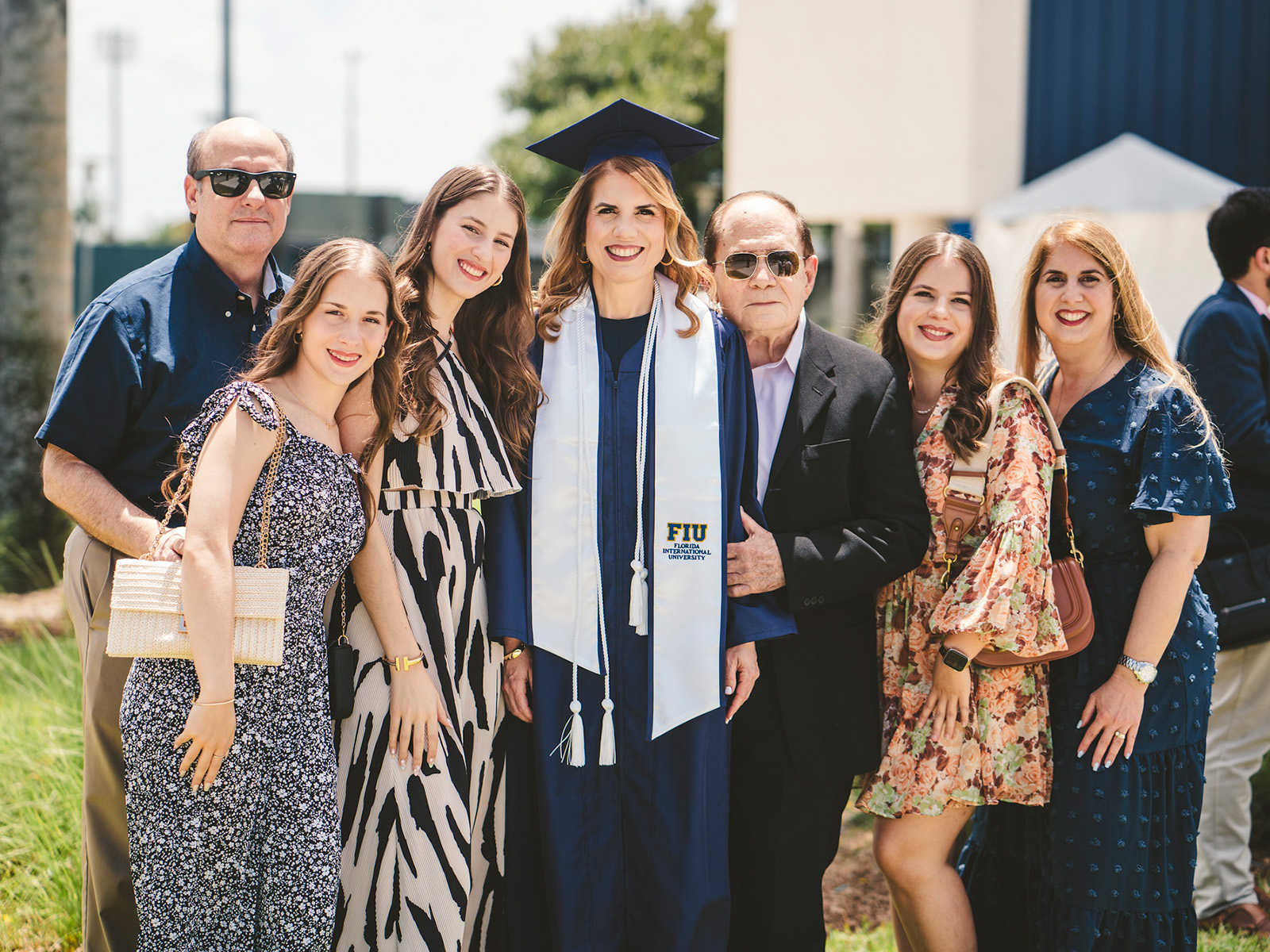 Graduate celebrating with family
