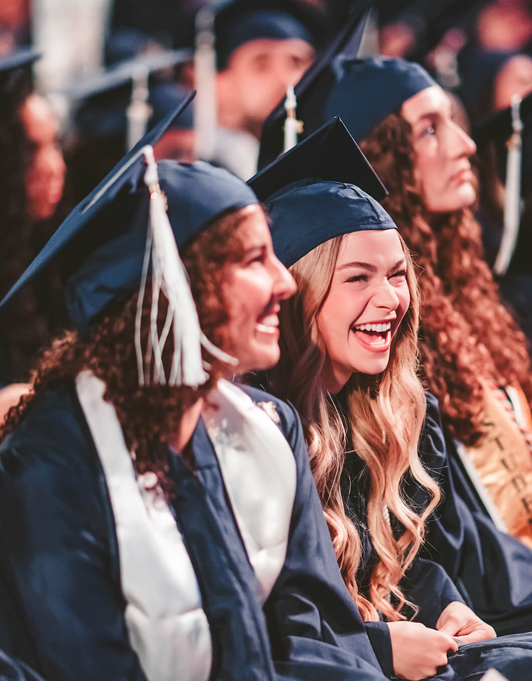 Graduate laughing
