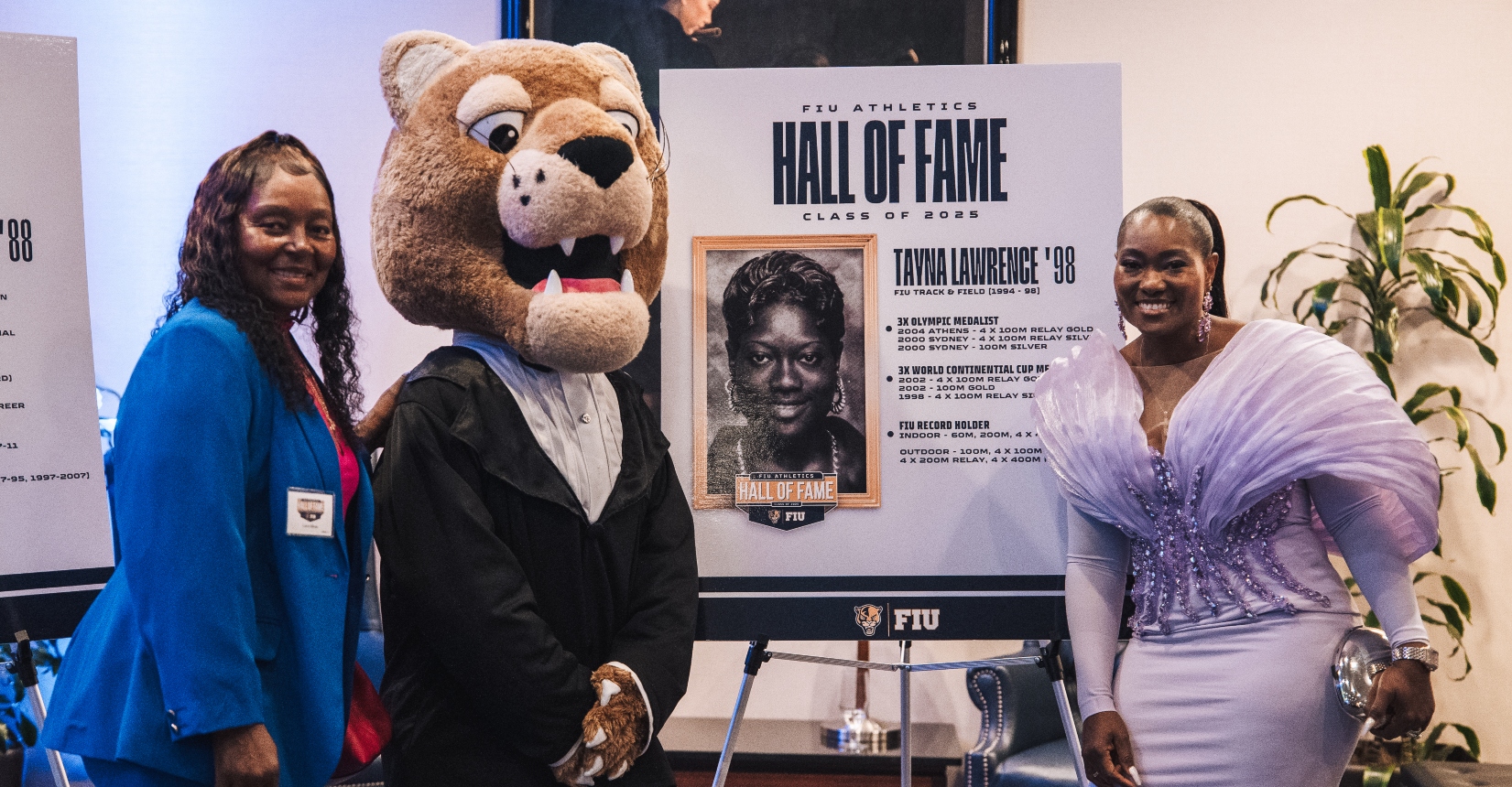 Tayna Lawrence poses for a photo at the Hall of Fame banquet