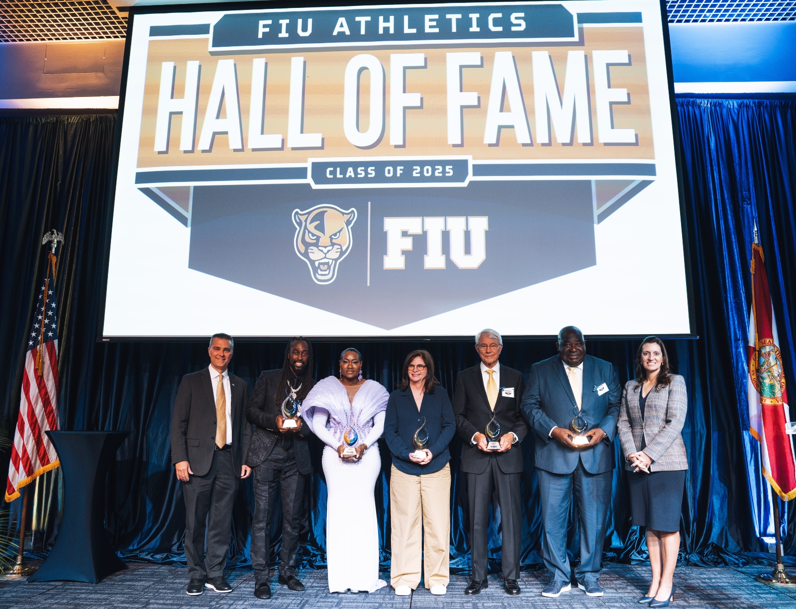 President Jeanette Nuñez and Athletics Director Scott Carr with Hall of Fame inductees T.Y. Hilton, Tayna Lawrence, Cindy Russo, Karl Kremser and Munga Eketebi