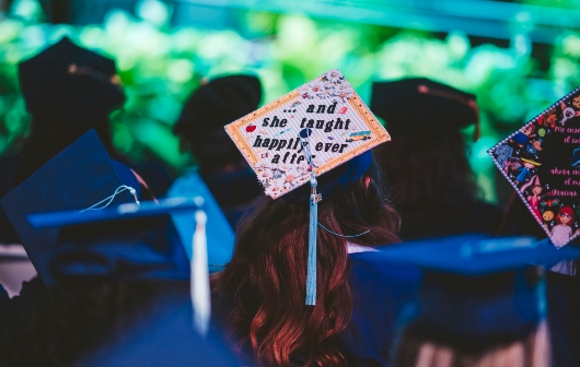 Graduate wearing decorated grad cap