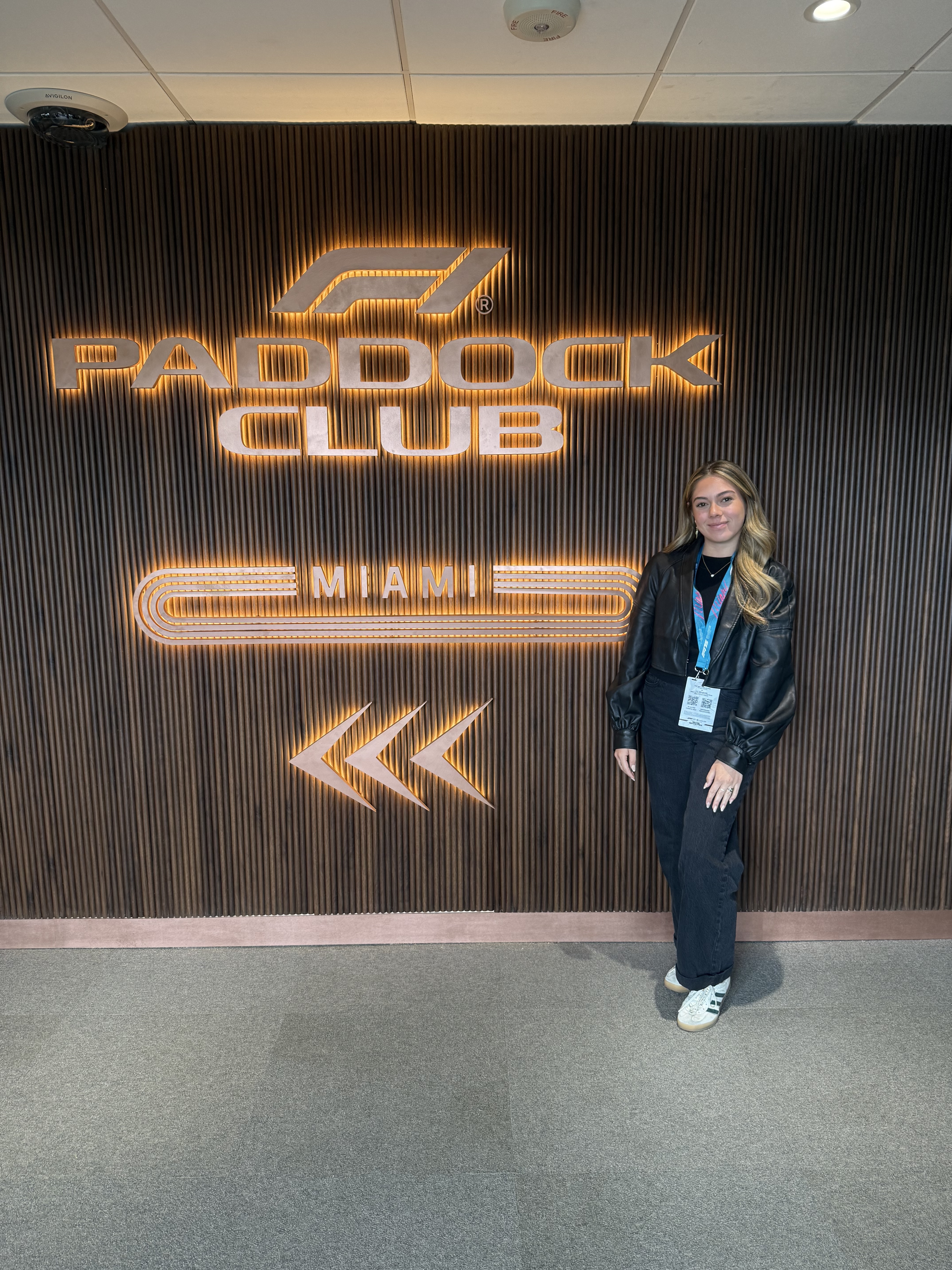 Alumna Izabella Jimenez manages a group of Brand Ambassadors at the F1 Paddock Club