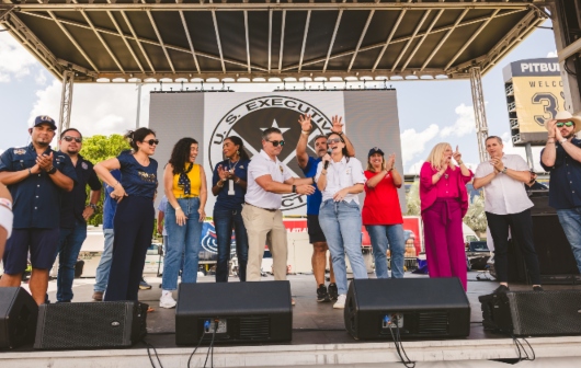 Public servants, government officials and others with Jeanette M. Nuñez