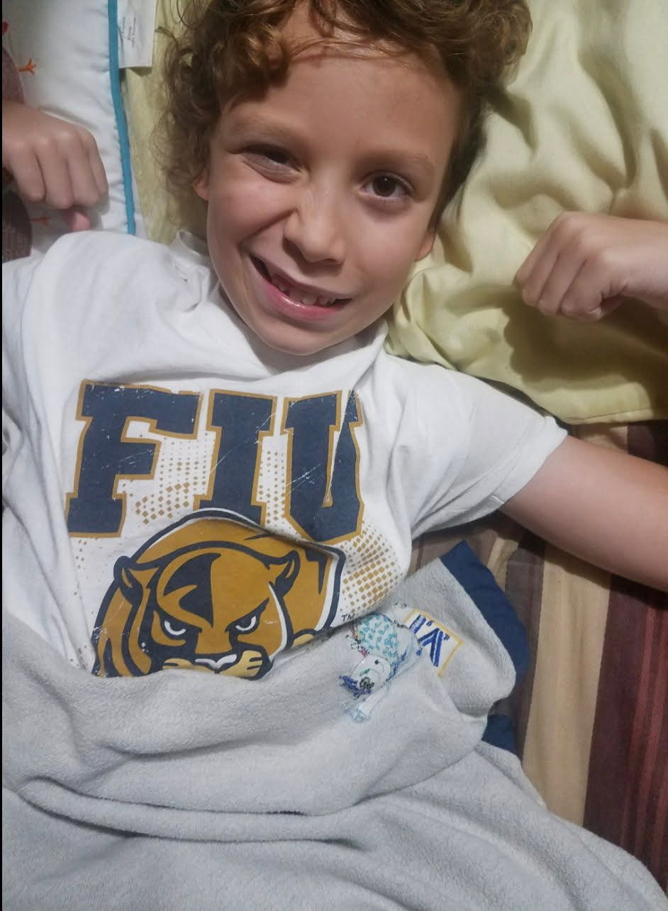 Kyam Ferrera as a child wearing his FIU shirt