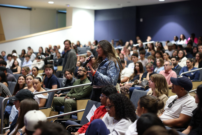 FIU student asks a question during interactive hospitality class.