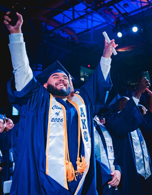 Graduate celebrating
