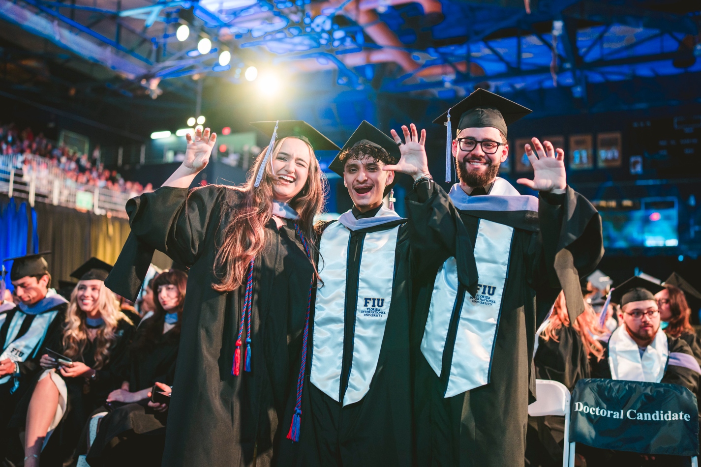 Graduates pose for a photo