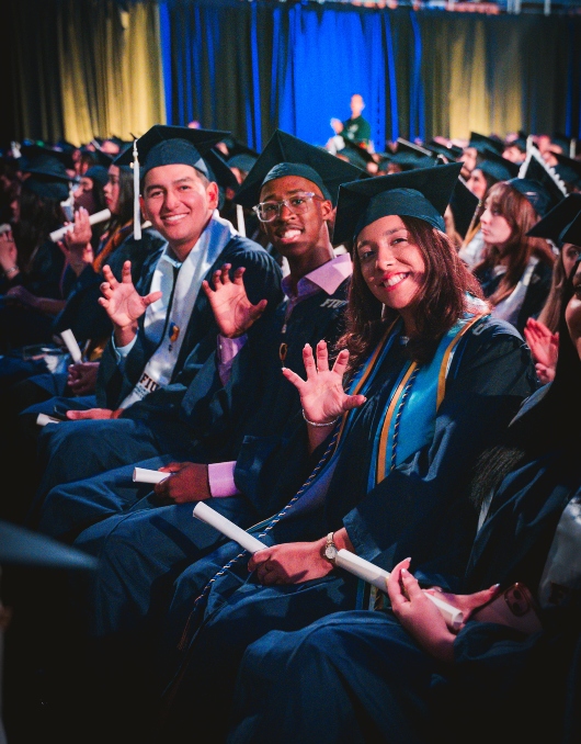 Graduate celebrating