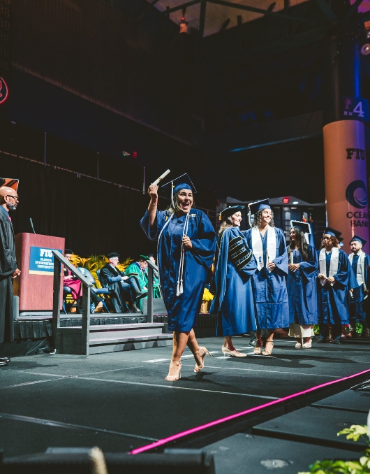 Graduate celebrating