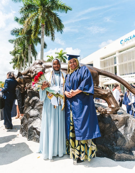Graduate celebrating with her family