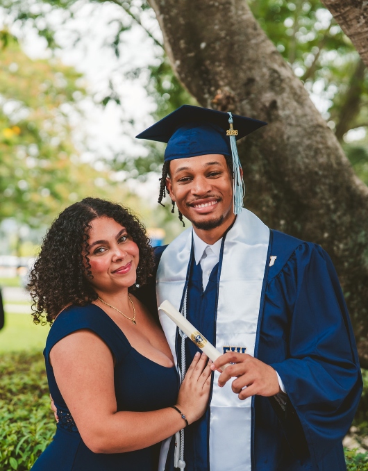 Graduate celebrating with girlfriend