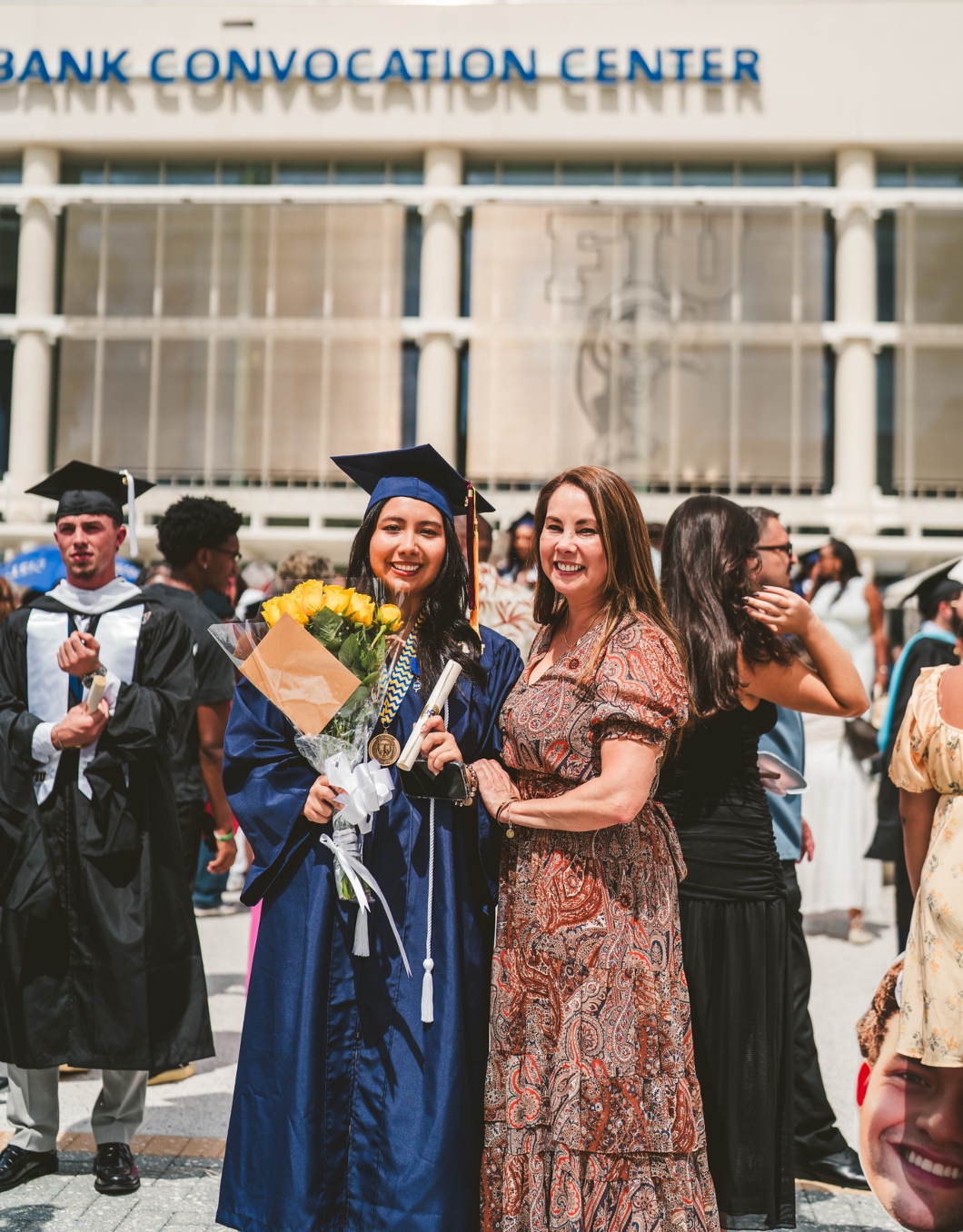 Graduate celebrating with her mom