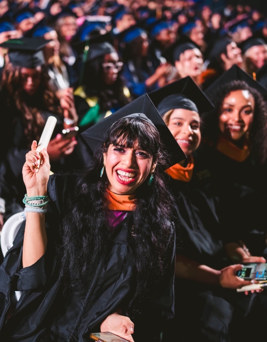 Graduate celebrating