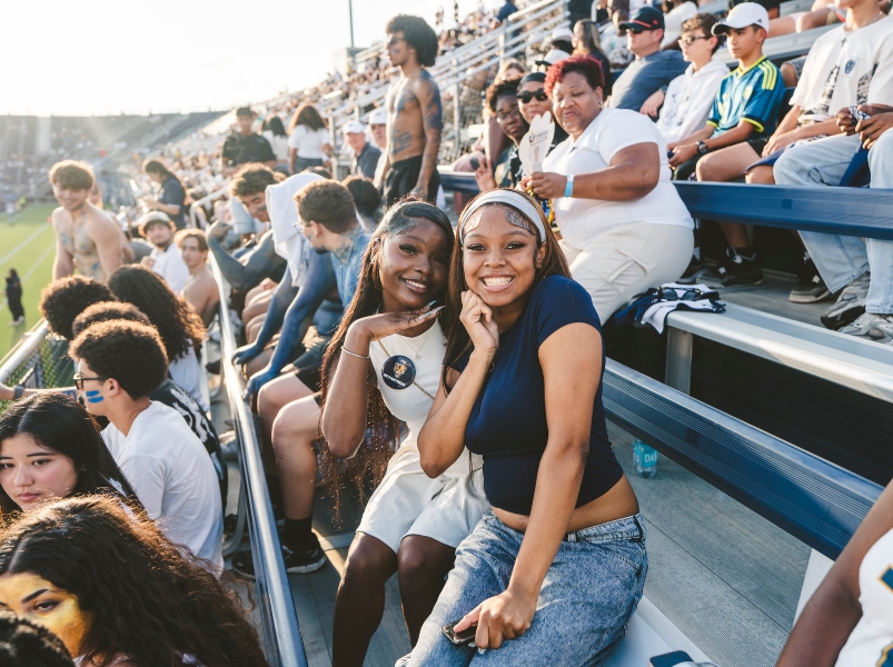 Students and fans enjoy the game