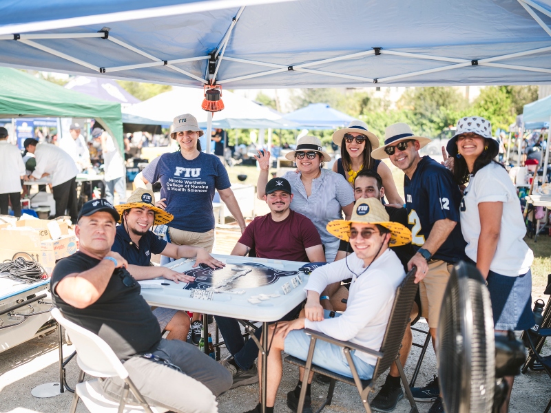 Attendees enjoying the pig roast