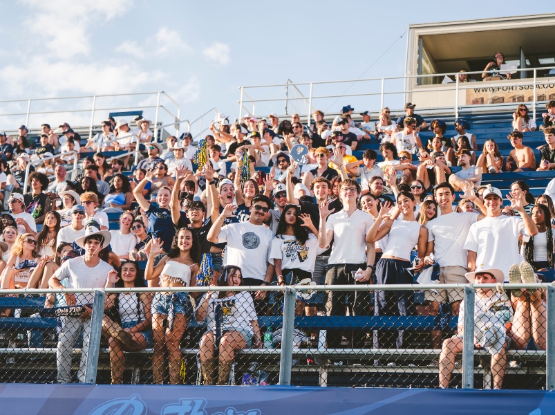 Students and fans enjoy the game