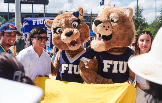 Paulina, the new female mascot, along with Roary
