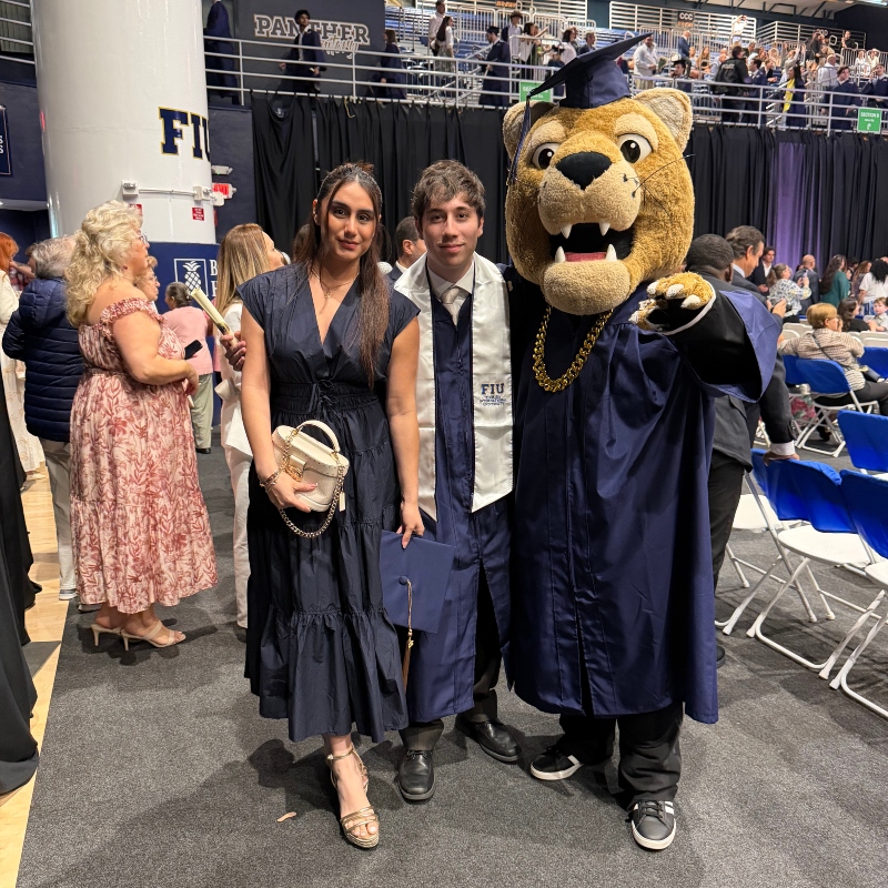 Escusel and Velez with Roary at Spring Commencement