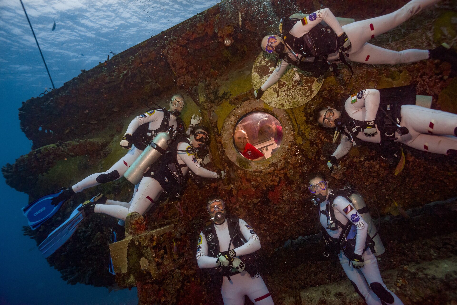 NASA astronauts swim outside FIU Aquarius Reef Base