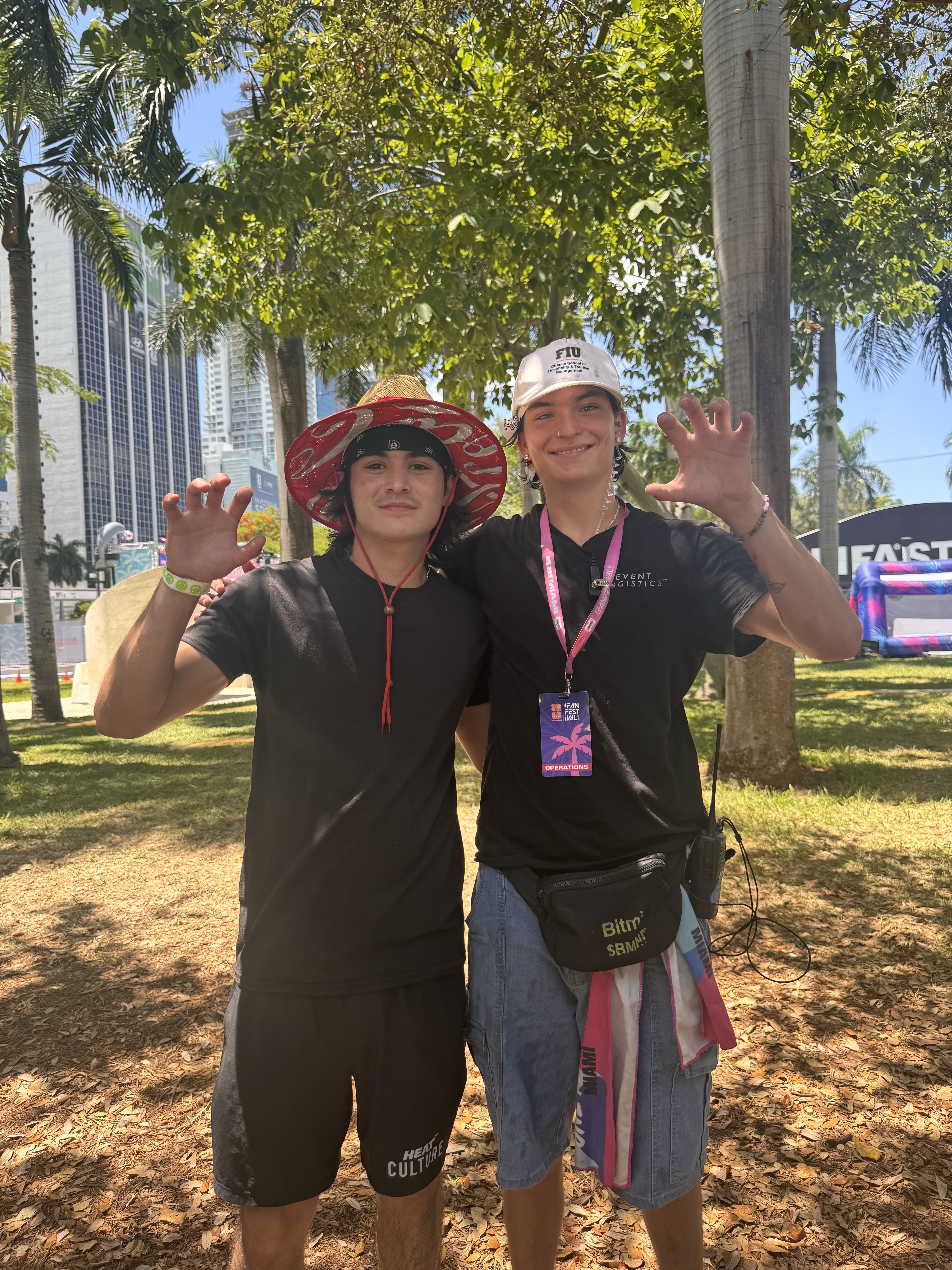 FIU Hospitality students, Ethan Amor and Jake Alyward (right), work FIFA Fan Fest