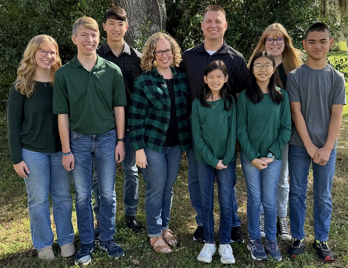Alumnus Josh Green of NASA with his family
