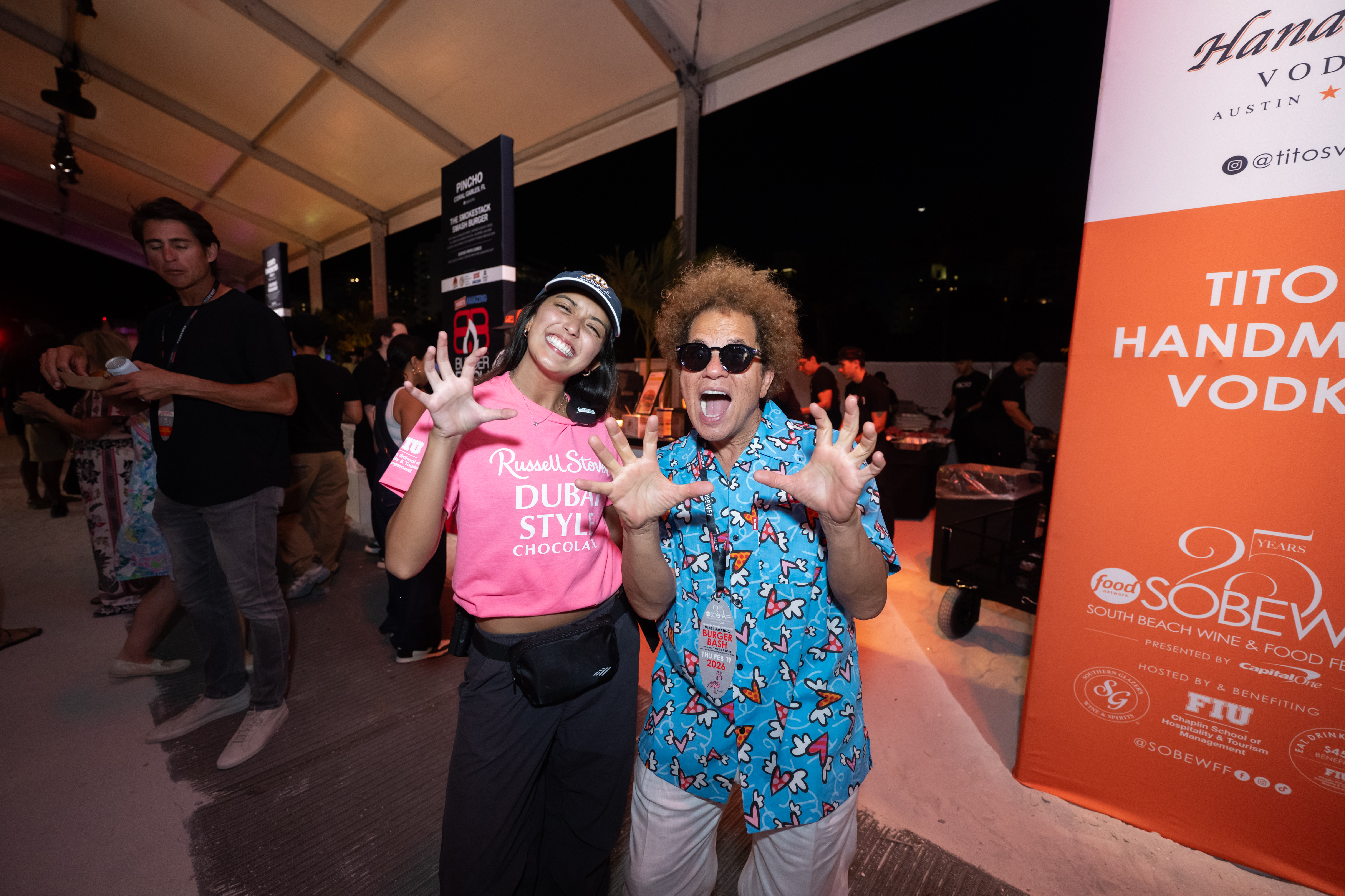 Artist Romero Britto with FIU student.