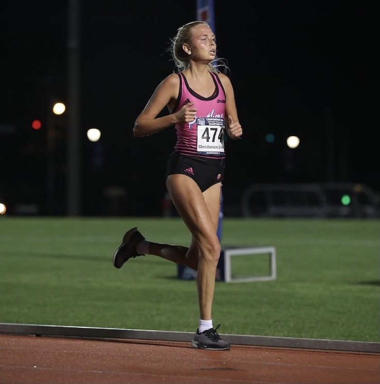 Emilie Christiansen running cross country