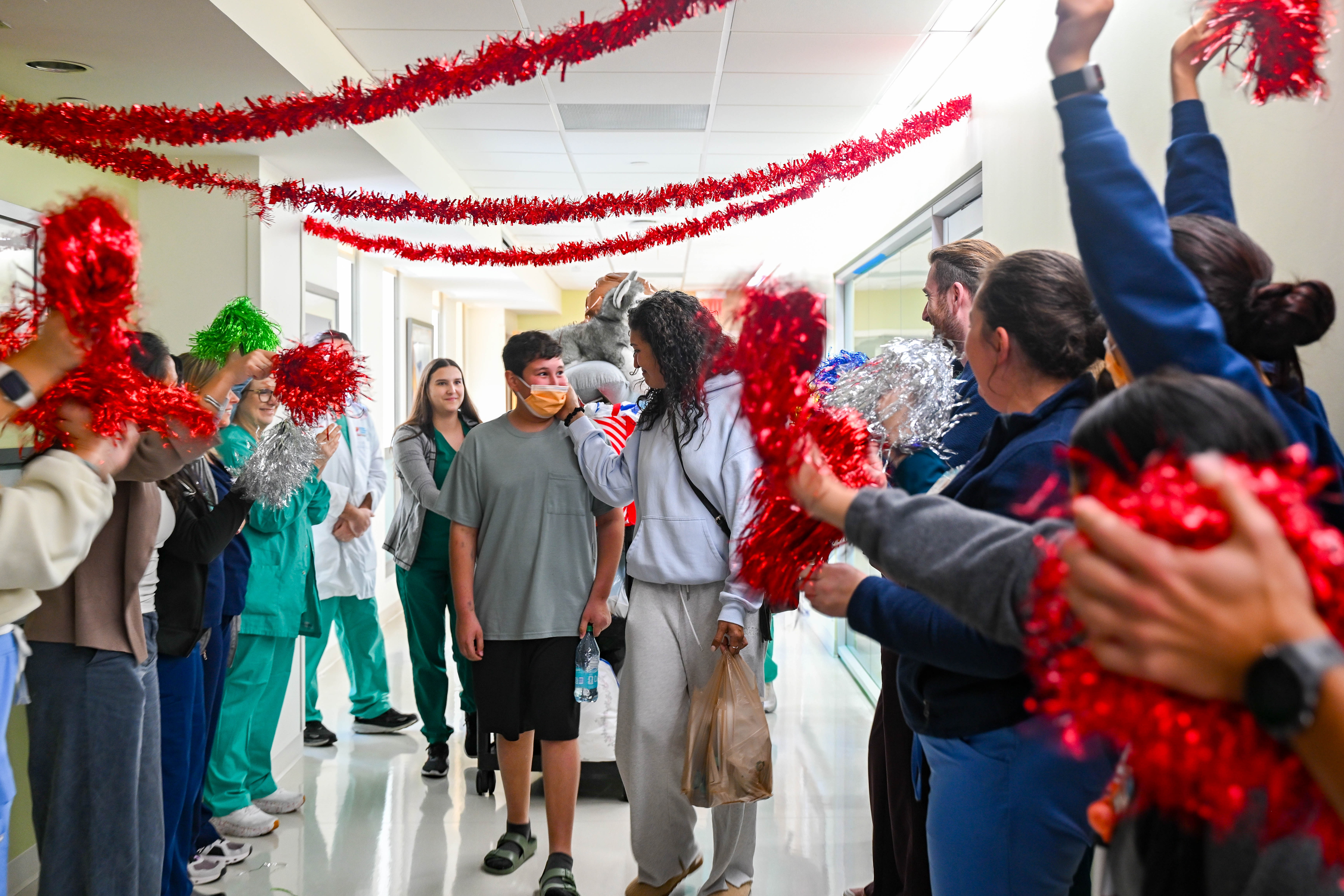 11 year old Greyson, Florida's first partial heart transplant recipient leaving the hospital.