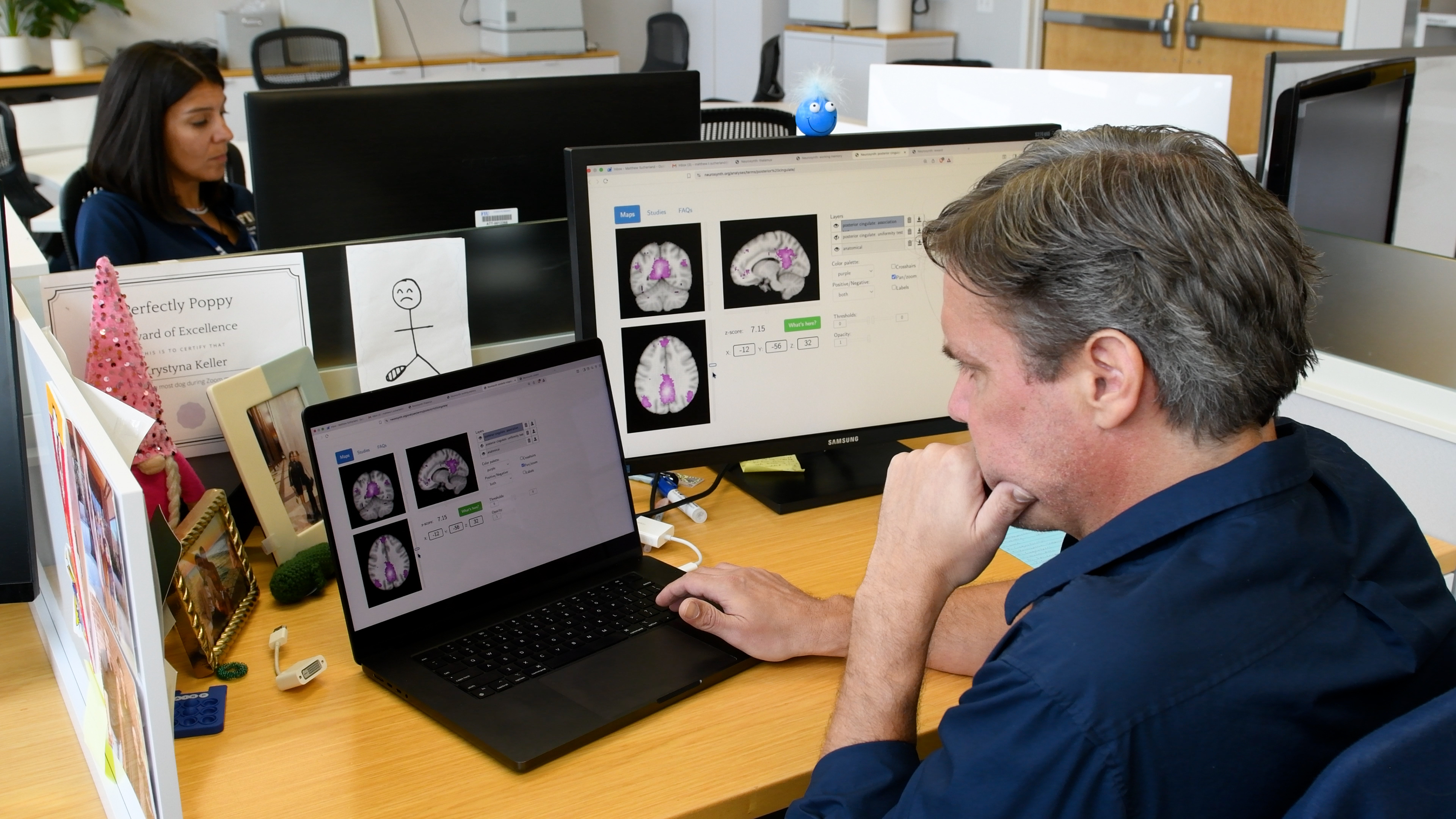 Dr. Sutherland examining the findings