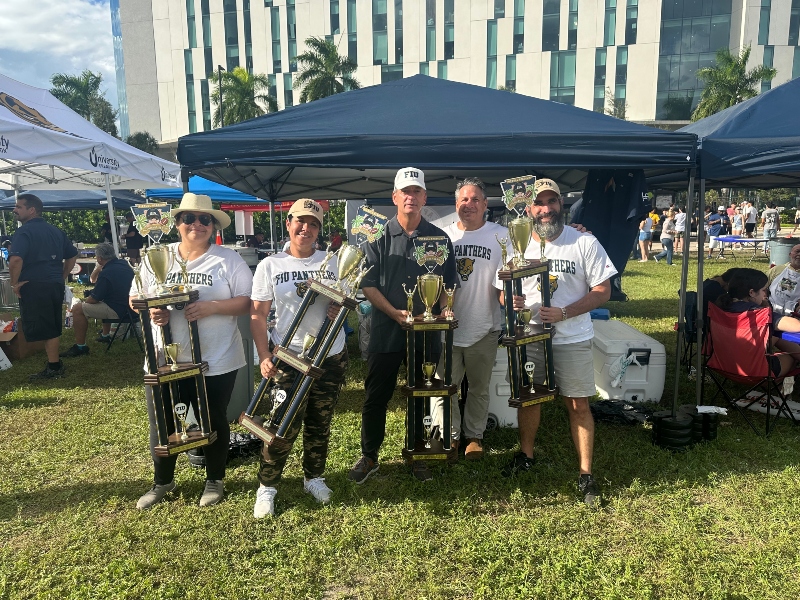 Team We Mean Business with their trophies